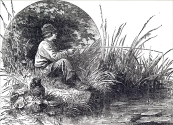 Un giovane ragazzo che pesca