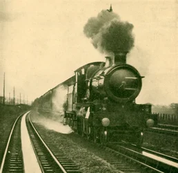 Un motore della classe Star che raccoglie acqua a velocità, Goring, Great Western Railway, 1930