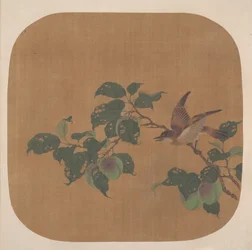 Ramo di albero fiorito con uccello