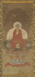 Buddha in trono su un tappeto di erba Kusa