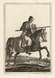 Cavaliere in carica del XII e XIII secolo in cotta di maglia, elmo piatto, lancia, scudo riscaldatore, armatura per le gambe, sella da guerra