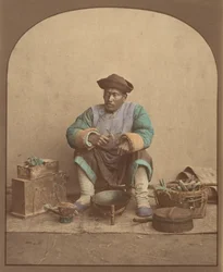 [Uomo cinese seduto con attrezzi], 1870s