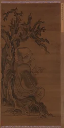Luohan seduto sotto un albero