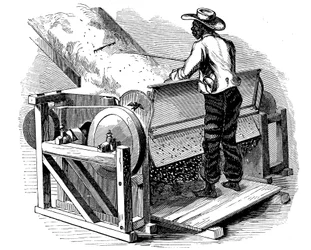 Sgranatrice per la pulizia del cotone azionata da un lavoratore nero scalzo, Stati Uniti meridionali, 1865