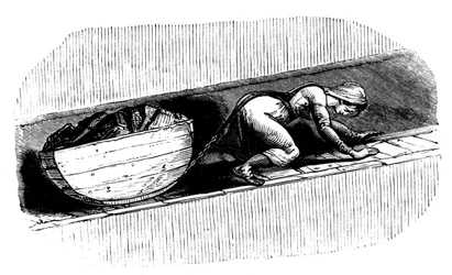 Donna che trascina una slitta di carbone lungo una stretta vena, Galles del Sud, c1848