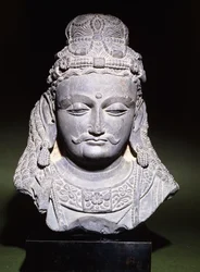 Grande testa di un Bodhisattva con espressione abbattuta, II-III secolo