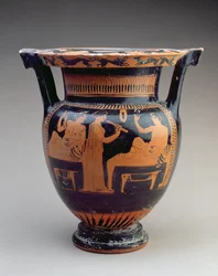Cratere a colonna attico a figure rosse con una scena di simposio di un suonatore di flauto tra due uomini reclinati, greco, c.420 a.C. (ceramica)