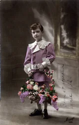 Cartolina di auguri di Buon Anno: un bambino con un cesto di fiori - Cartolina datata 1920