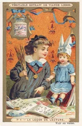 La lezione di lettura. Una bambina fa leggere l