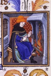 Rappresentazione allegorica di febbraio. Un uomo si riscalda davanti al suo camino. Miniatura di un manoscritto del XIV secolo