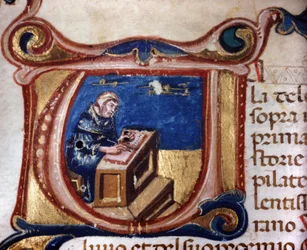 Monaco copista. Manoscritto del XIII secolo. Biblioteca Trivulziana, Milano