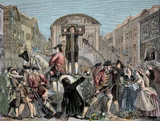 Daniel Defoe (De Foe) (1659-1731) alla gogna a Londra nel 1703 per aver pubblicato il suo trattato ironico "The Shortest Way With the Dissenters" - Lo scrittore e avventuriero Daniel Defoe (1659-1731) condannato nel 1703 alla gogna per i suoi scritti contr