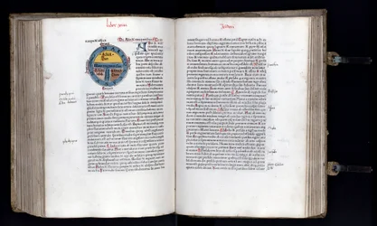 Doppia pagina con la mappa schematica del mondo sul modello T-O, sono rappresentati tre continenti (Asia, Africa ed Europa). Manoscritto "Etymologiae" di Isidoro di Siviglia