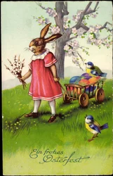 Buona Pasqua, il coniglietto di Pasqua tira i carri, le uova di Pasqua, i passeri