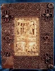 Psalterio di Carlo il Calvo: miniatura in avorio raffigurante Nathan che uccide il bambino, figlio della relazione adulterina del re Davide e Betsabea. 850-875. Parigi, B.N.