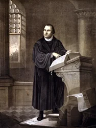 Martin Lutero (1483 - 1546) che legge in una chiesa