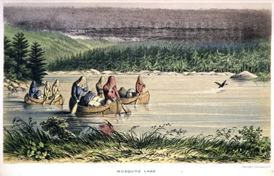 Lago Mosquito in Canada: indiani attraversano il lago in canoa con reti anti-zanzare sulla testa - in "Exploration of the Labrador Peninsula" di Hind, Londra