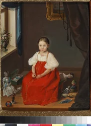 Ritratto di una bambina in abito rosso con giocattoli