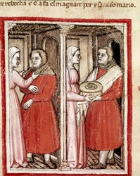 Rebecca dà a suo figlio Giacobbe, vestito con gli abiti di Esaù, un piatto di carne di capretto affinché possa portarlo al suo padre cieco Isacco e prendere la sua benedizione al posto di Esaù Miniatura dal codice 212 (o codice padovano o Bibbia di Padova)