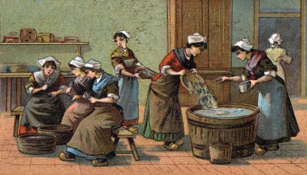 Industria della sardina: taglio delle teste, salatura. Cromolitografia della fine del XIX secolo