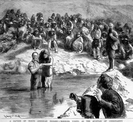 Il battesimo in Nord America di un indiano da parte di un mormone che posa davanti alla telecamera come apostolo del cristianesimo. Illustrazione del XIX secolo