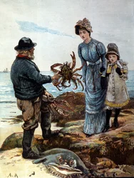 Un pescatore mostra un grosso granchio a una madre e una figlia