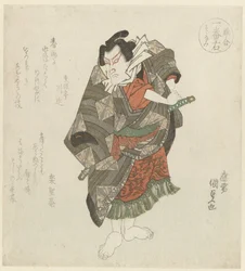 Uomo in piedi che afferra la sua spada