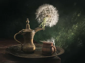 Natura morta con caffè al dente di leone