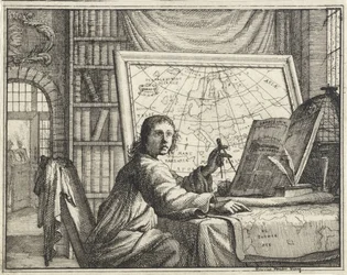 Uomo con compasso vicino a mappe