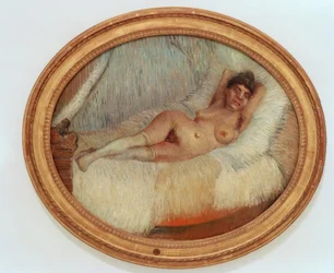 Nudo femminile su un letto