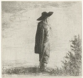 Uomo con cappello e bastone in un paesaggio