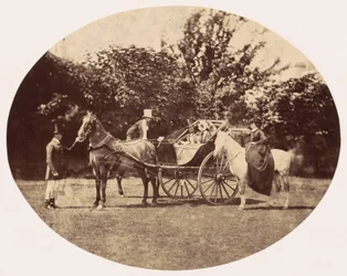 Carrozza trainata da cavalli e cavaliere femminile