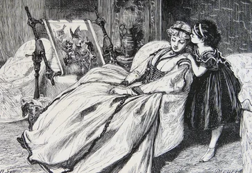 Madre che lavora a un pezzo di ricamo