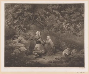 Famiglia che riposa in un bosco