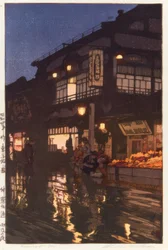 La strada Kagurazaka di notte, dopo la pioggia